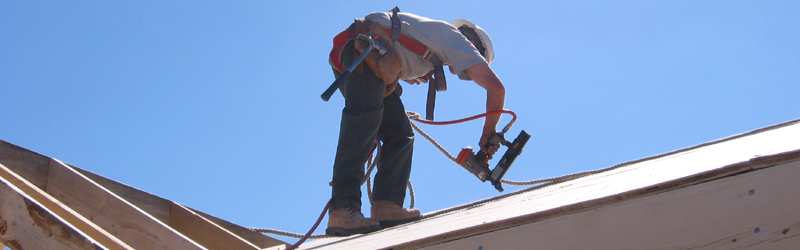Tim Hattle of Hattle Framing Inc. Safely in action on the Roof